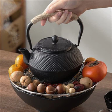 Tetera d'esmalt amb recobriment de seguretat